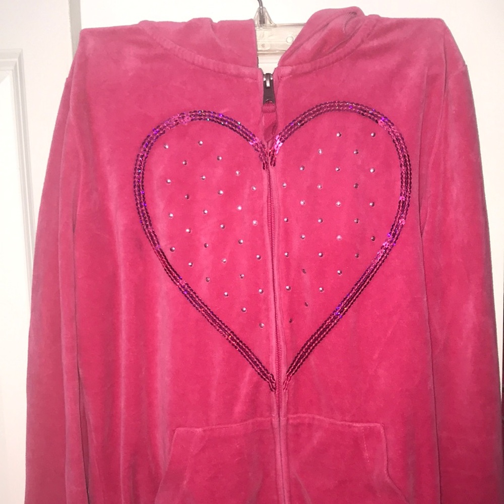 A pink colored jacket with a heart!!